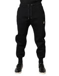 Dolce & gabbana black modal jogger pants with subtle white dc shoes logo on thigh and matching drawstrings