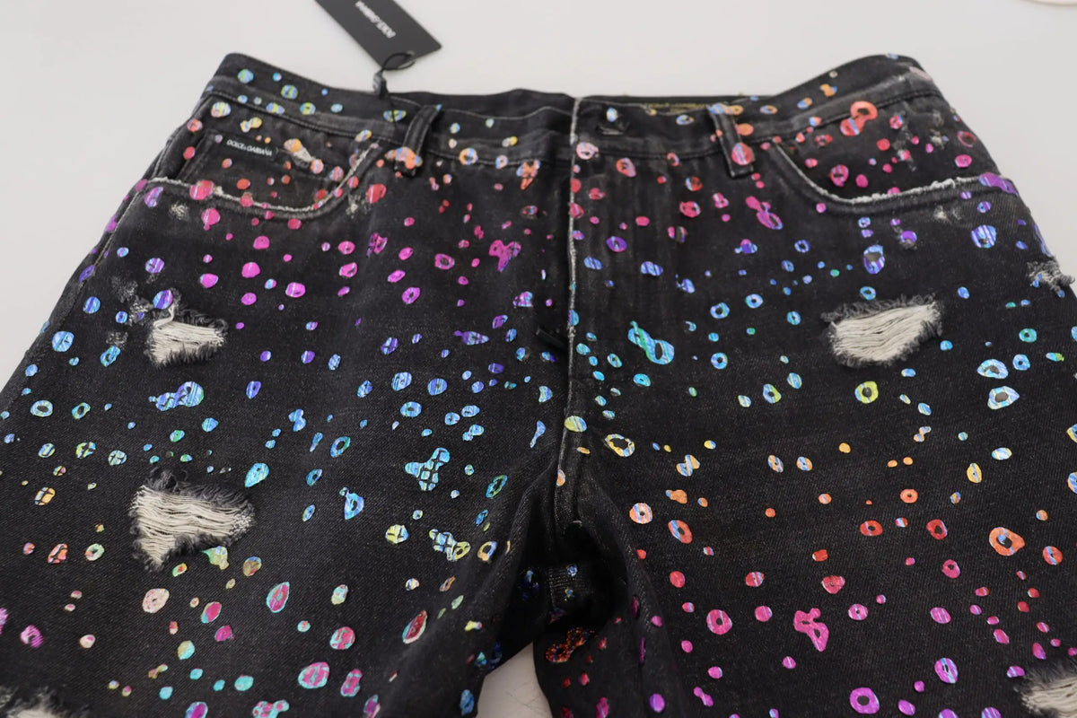 Short en jean noir dolce & gabbana avec imprimé multicolore éclaboussé, déchirures et bords effilochés