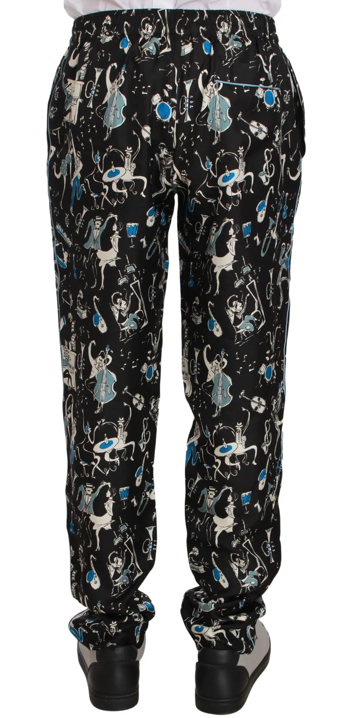 Pantalon de nuit dolce & gabbana noir avec motif ludique de musiciens et instruments en blanc bleu clair et bleu sarcelle