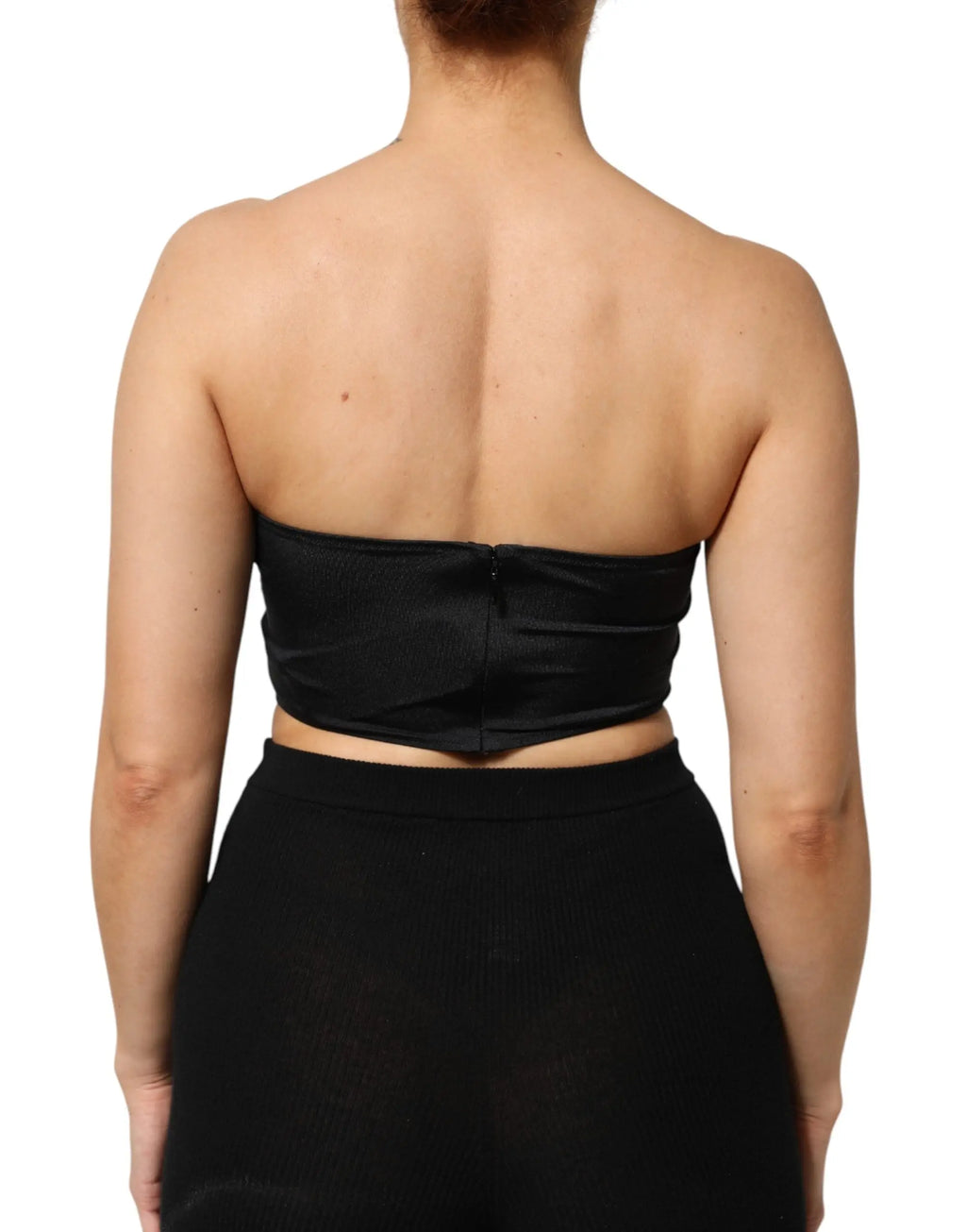 Dos d un top bandeau noir dolce gabbana en mélange de nylon avec fermeture éclair centrale et détail froncé