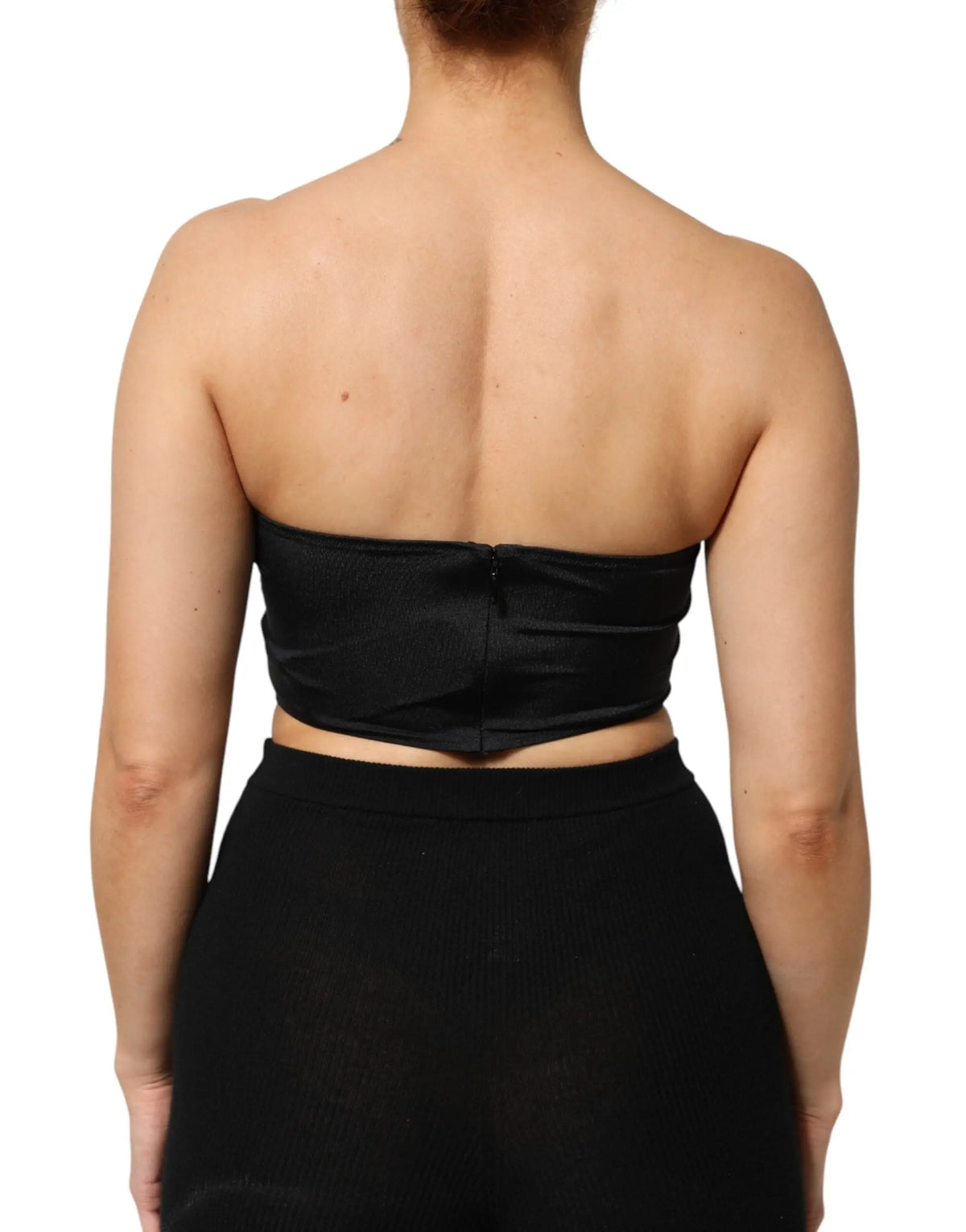 Dos d un top bandeau noir dolce gabbana en mélange de nylon avec fermeture éclair centrale et détail froncé