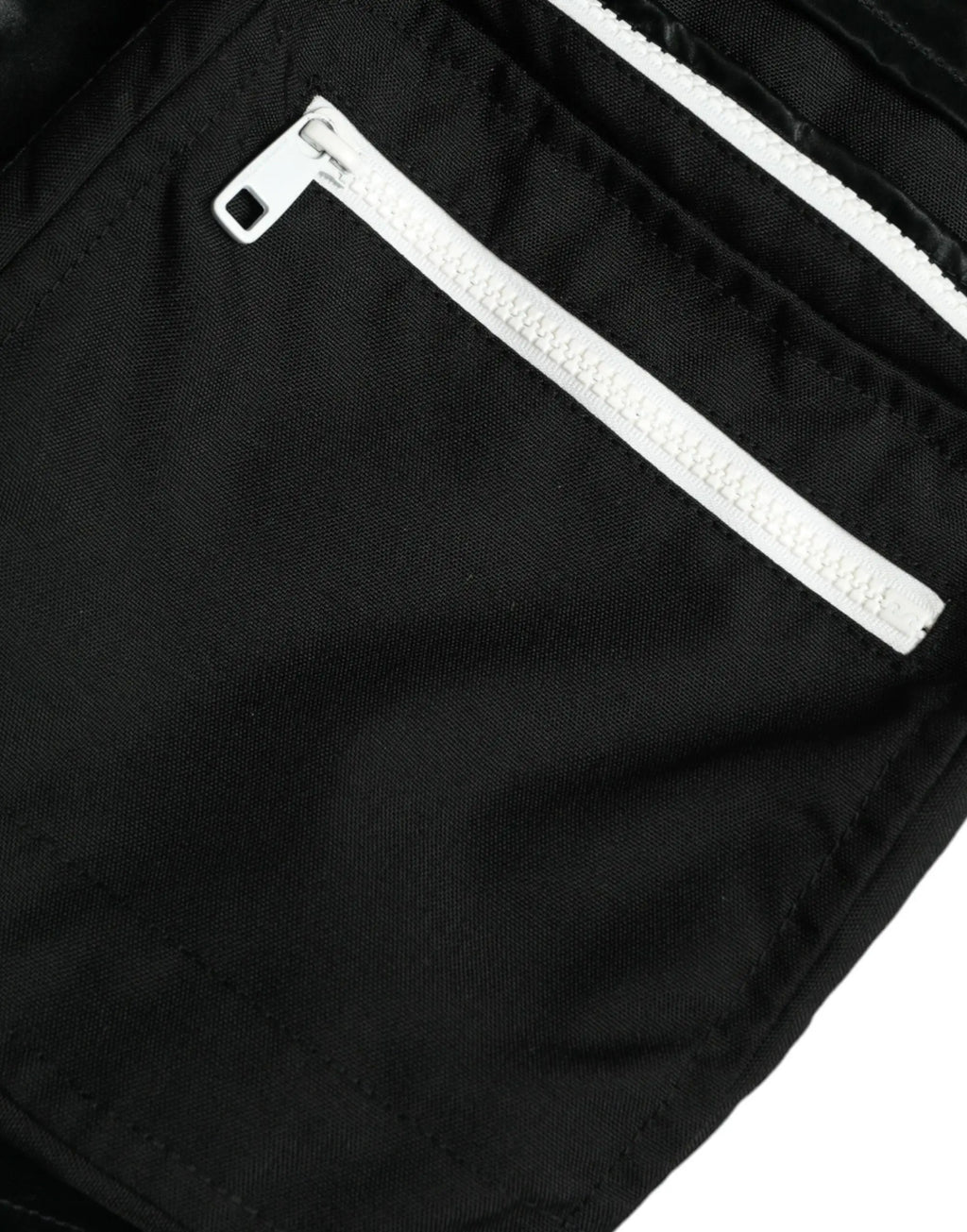 Sac à dos noir en nylon avec fermeture éclair blanche et tirette pour pantalons cargo jogger homme dolce et gabbana