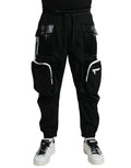 Pantalon cargo noir dolce & gabbana en nylon avec poches en cuir verni et zips blancs pour homme