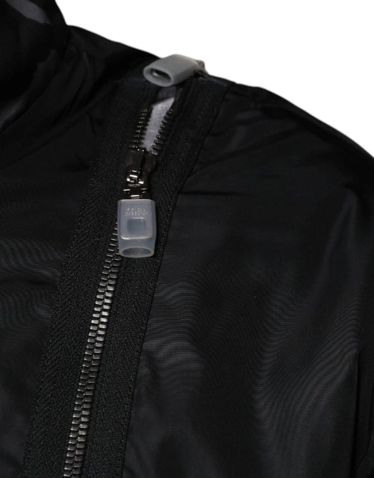 Fermeture éclair en nylon noir avec tirette en plastique transparent et curseur gris sur veste bomber homme dolce & gabbana