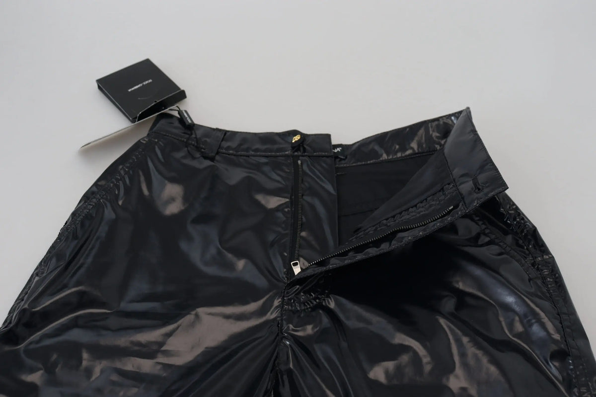 Pantalon skinny noir en nylon dolce & gabbana taille haute avec fermeture éclair et détails dorés en cuir verni noir