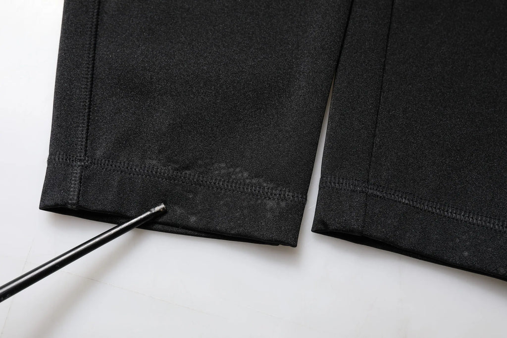 Pantalon noir dolce gabbana en nylon taille haute coupe slim avec tissu lisse et ourlets soigneusement cousus