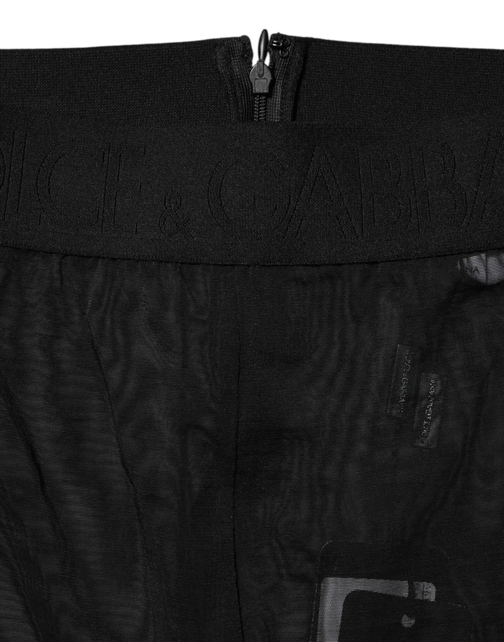 Pantalon noir dolce & gabbana taille haute en nylon stretch avec tissu texturé et logo embossé subtil sur la ceinture