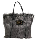 Dolce & gabbana sac fourre-tout oversize en fausse fourrure noire avec poignées en cuir noir et plaque métallique dorée