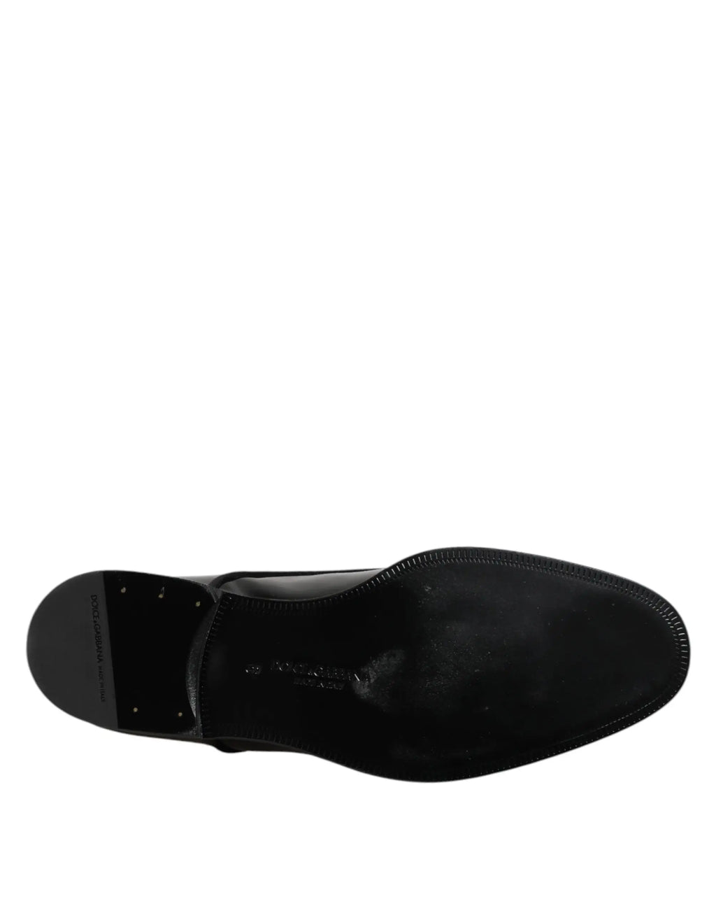 Semelle de chaussure derby noire en cuir verni dolce gabbana avec bord cousu et logo embossé