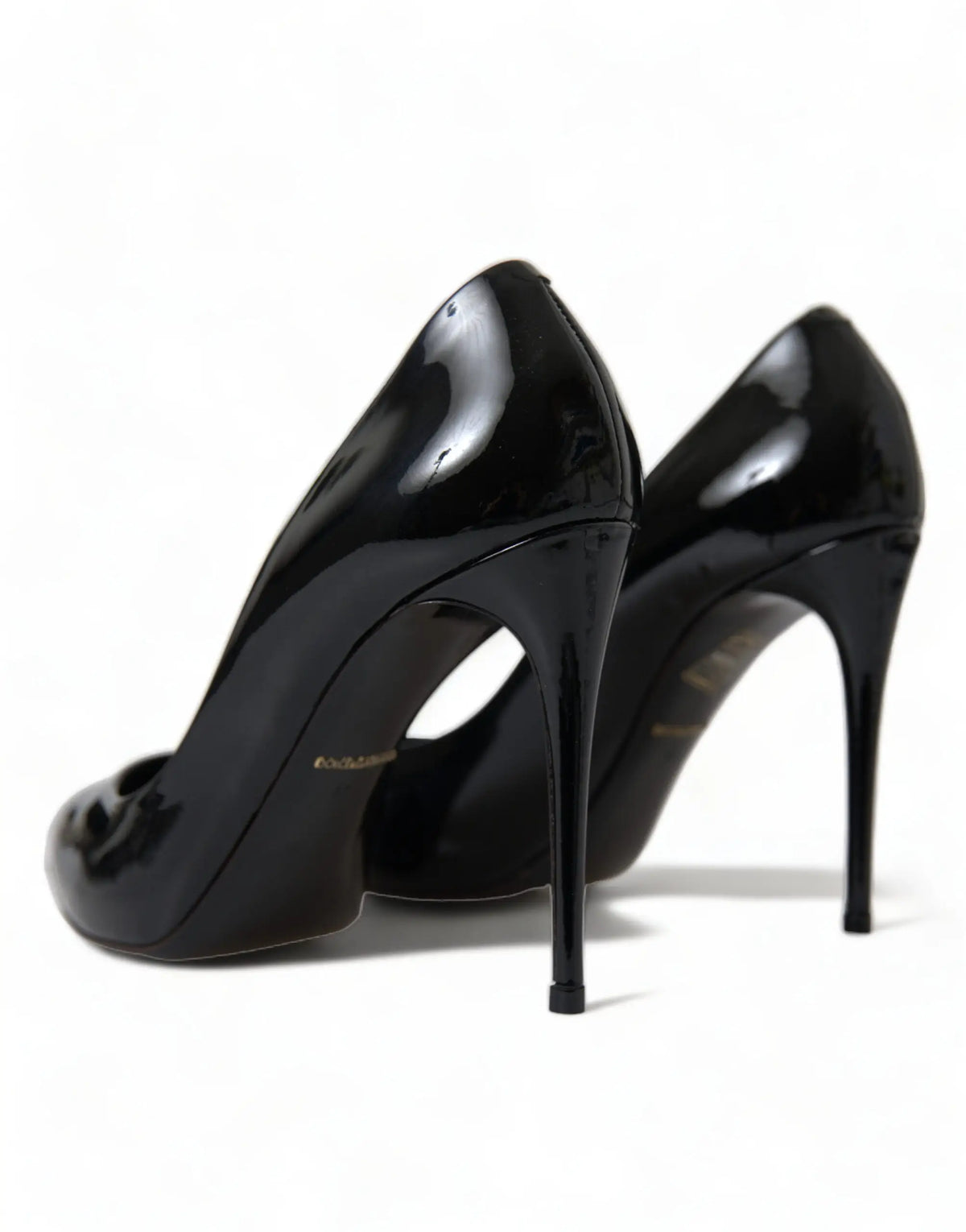 Dolce & gabbana pumps noirs en cuir verni à talons aiguilles fins et finition brillante