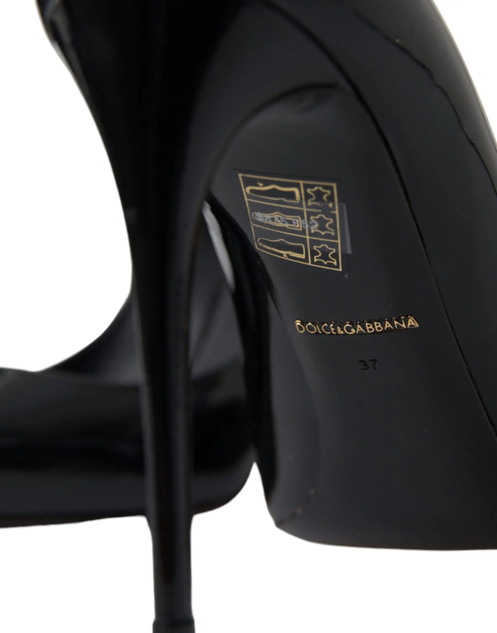 Escarpins dolce gabbana noirs en cuir verni avec talons hauts et logo doré sur la semelle intérieure