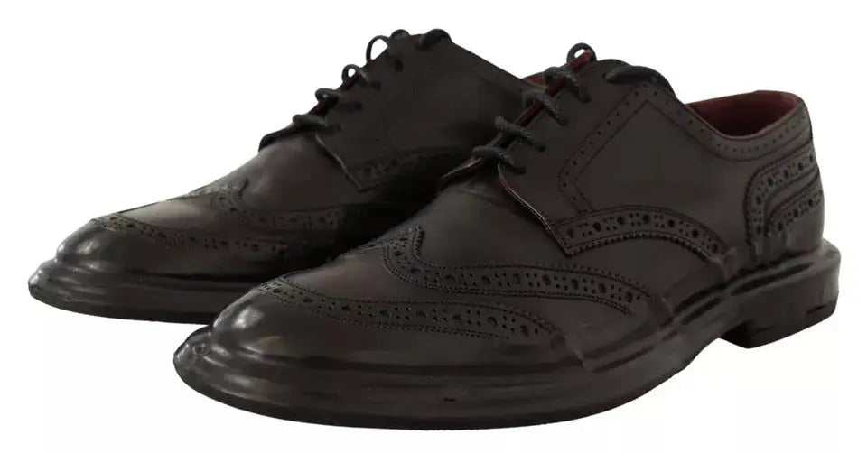 Dolce & gabbana chaussures derby en cuir noir perforé avec lacets sombres et détails brogue