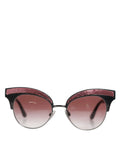 Lunettes de soleil cat eye dolce & gabbana noires avec bande pailletée rose et verres marron dégradé