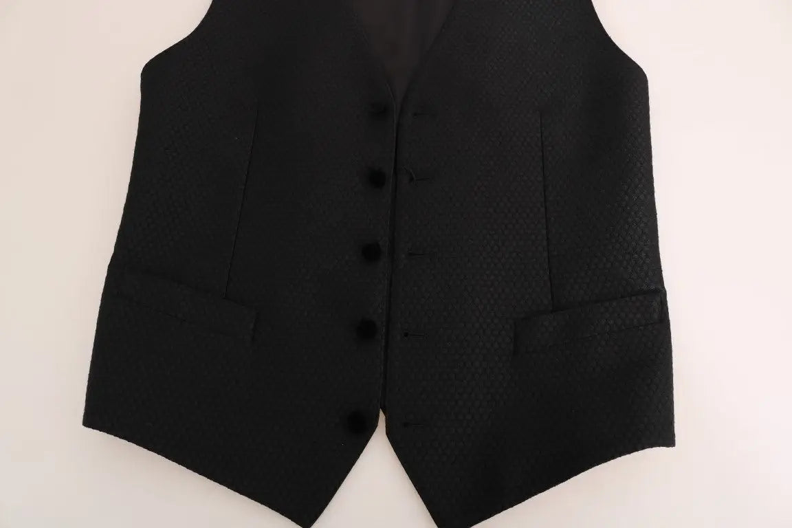 Dolce gabbana veste noire en laine texturée avec motif à pois, cinq boutons noirs et poches à rabat
