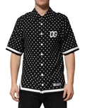 Dolce & gabbana polo t-shirt noir à manches courtes avec pois blancs et bordures blanches au col et aux manches