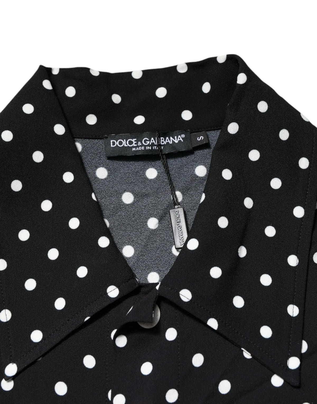 Blouse dolce & gabbana noire à pois blancs avec col et manches courtes style polo
