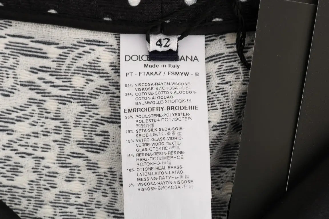Étiquette dolce & gabbana indiquant un pantalon sicily cristal noir à pois en viscose coton soie et polyester fabriqué en italie