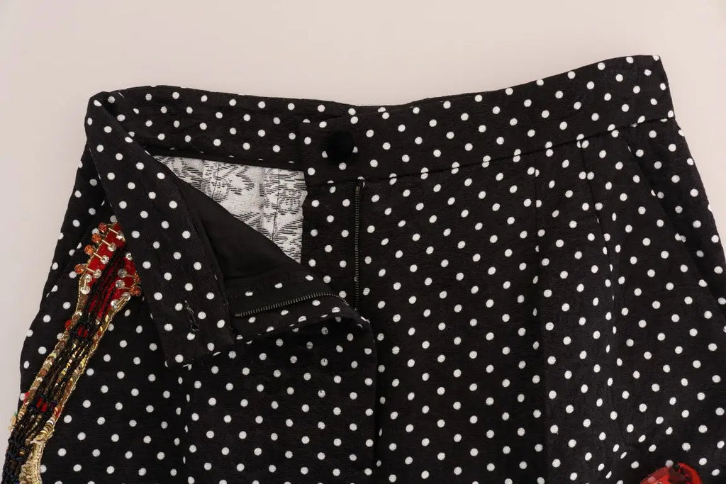Pantalon noir dolce & gabbana à taille haute avec pois blancs et embellissement rouge en perles cristal sur le côté