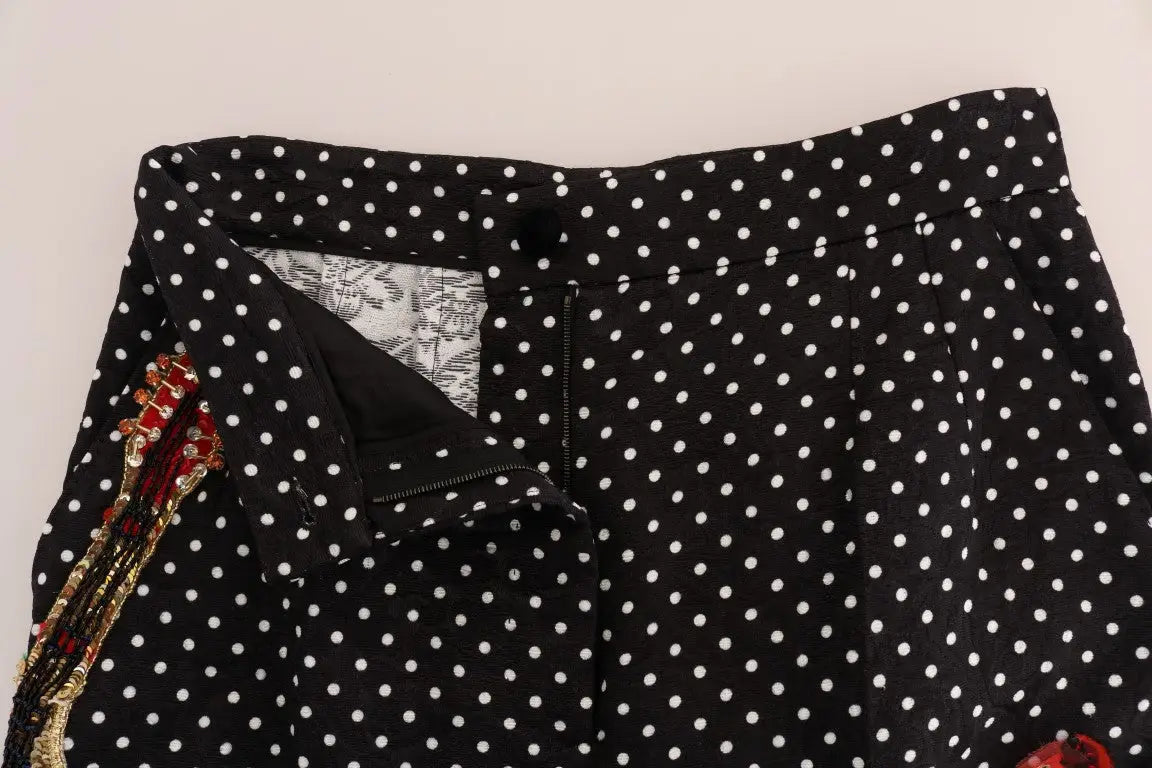 Pantalon noir dolce & gabbana à taille haute avec pois blancs et embellissement rouge en perles cristal sur le côté