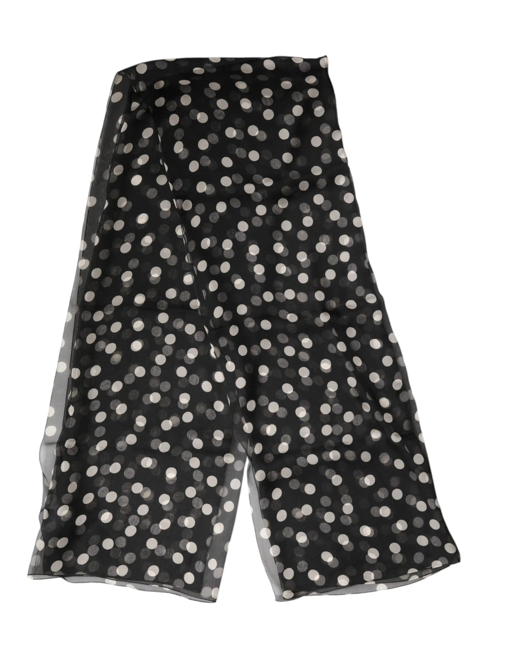 Jupe portefeuille en mousseline noire à pois blancs avec tissu transparent et fluide dolce gabbana