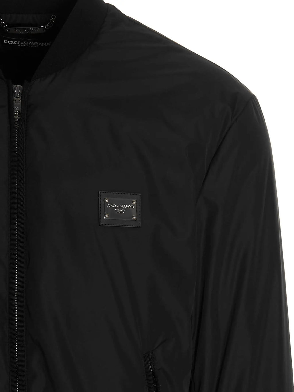 Blouson bomber dolce & gabbana noir en polyamide avec finition brillante et patch en cuir signature sur la poitrine
