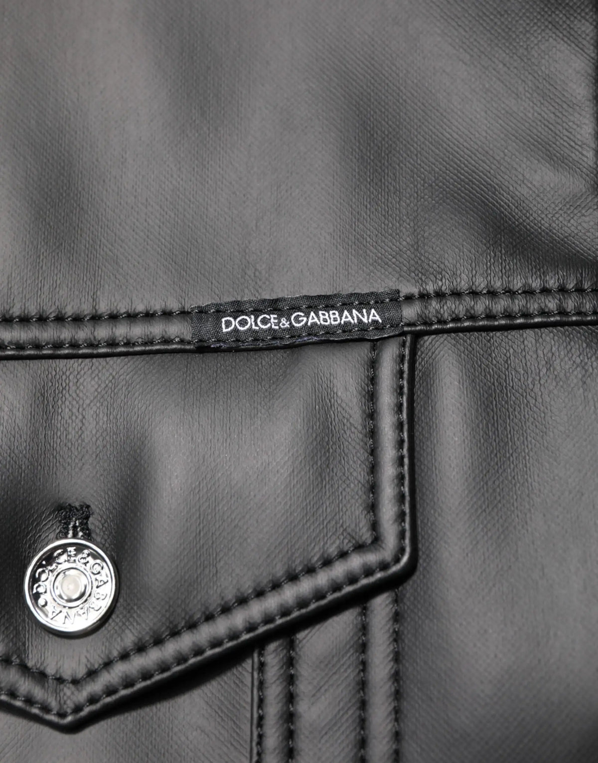 Veste biker dolce & gabbana noire en polyester avec bouton argenté et étiquette de marque visible