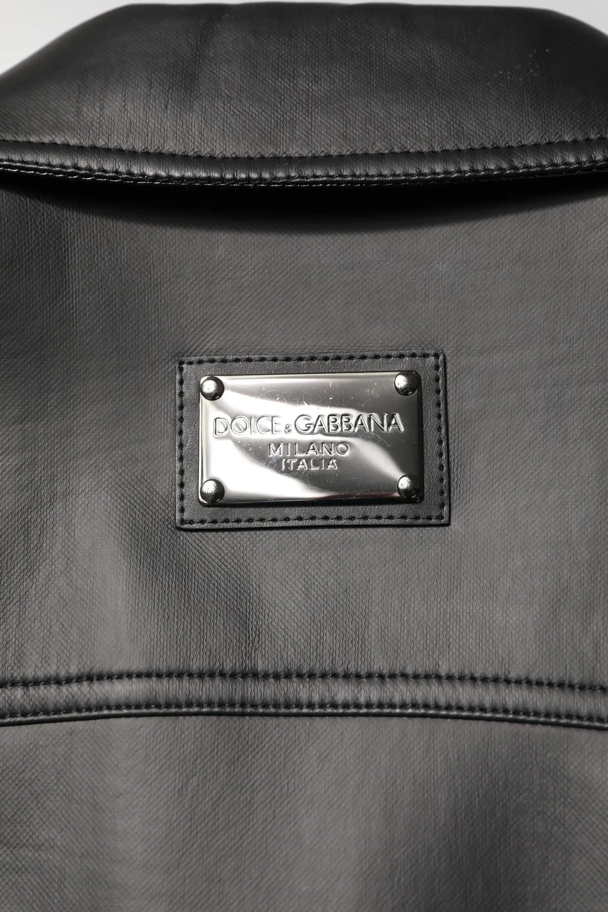 Veste motard dolce gabbana noire en polyester avec plaque métal argentée logo milano italia
