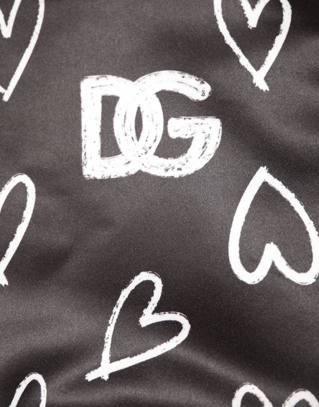 Tissu noir avec motif de coeur blanc style craie et logo dg sur veste bomber dolce & gabbana en polyester