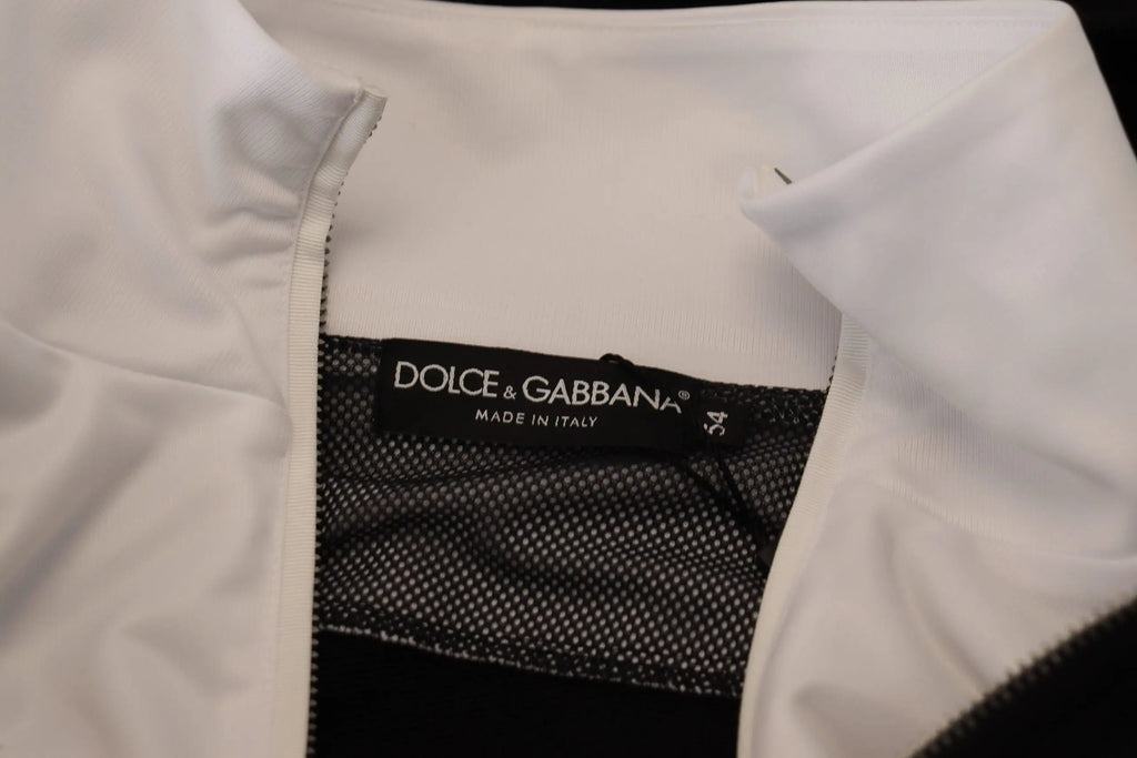 Veste dolce gabbana noire en polyester avec capuche fermeture zippée intégrale doublure en maille noire et étiquette taille 54 blanche