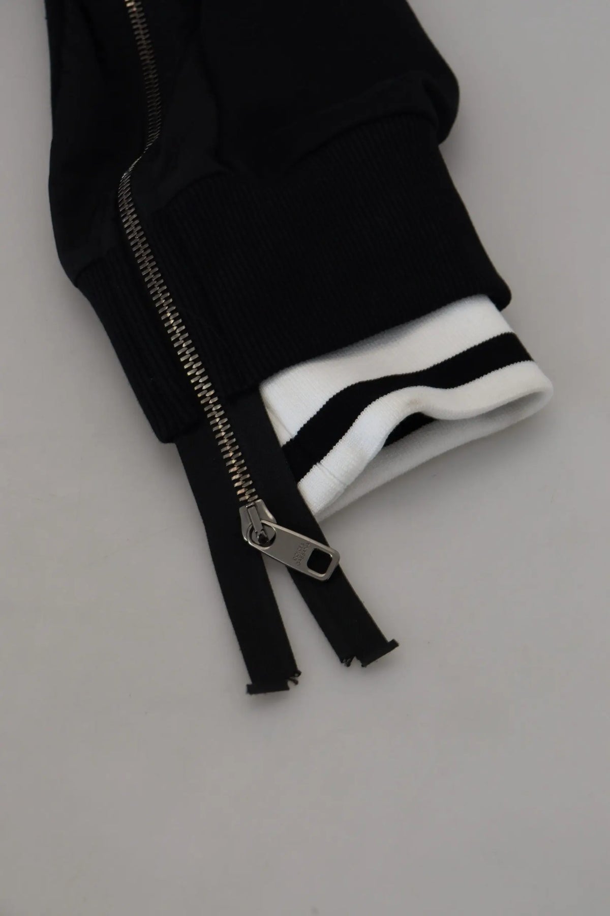 Manche de sweat à capuche dolce & gabbana noir en polyester avec fermeture éclair et bord-côte rayé noir et blanc