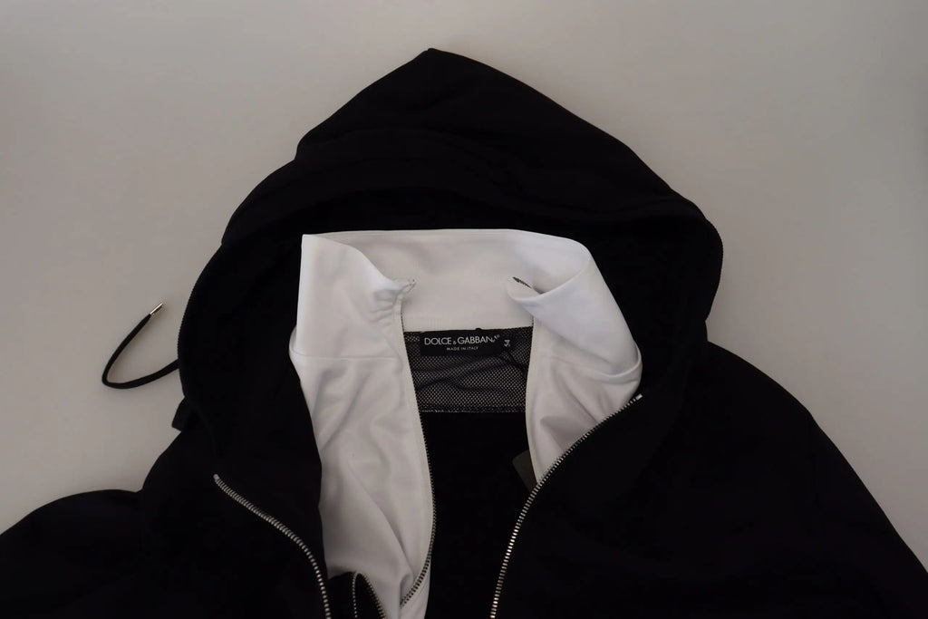 Veste noire dolce & gabbana en polyester avec capuche, doublure intérieure blanche contrastante et fermeture éclair argentée