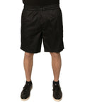 Shorts noirs dolce & gabbana en jersey polyester avec taille mi-haute, cordon et ourlet effiloché en velours côtelé