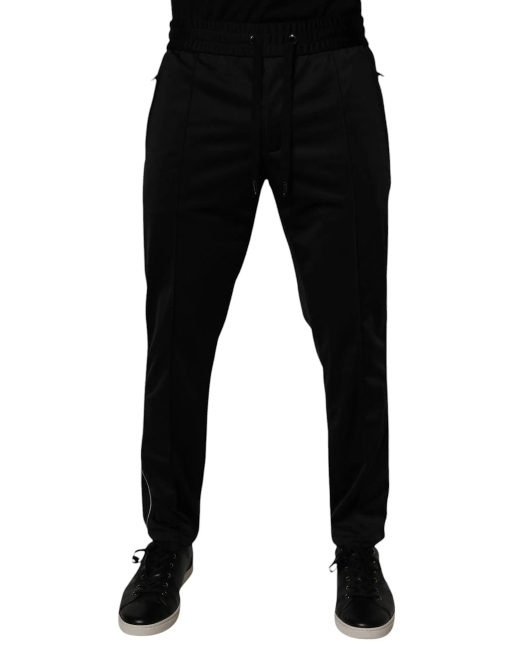 Joggers noirs Dolce & Gabbana en polyester avec taille ajustable et piping blanc subtil sur les côtés