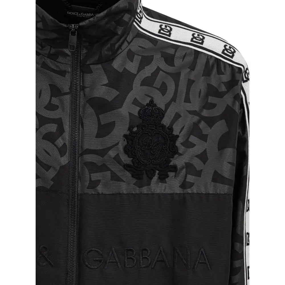 Dolce & Gabbana veste noire en polyester avec monogramme, écusson brodé et bandes blanches contrastantes