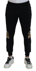 Dolce & gabbana pantalon jogging skinny homme noir en polyester avec empiècements imprimé léopard aux jambes