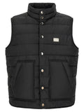 Dolce & Gabbana veste sans manches noire en polyester avec quilting matelassé, boutons argentés et écusson métallique