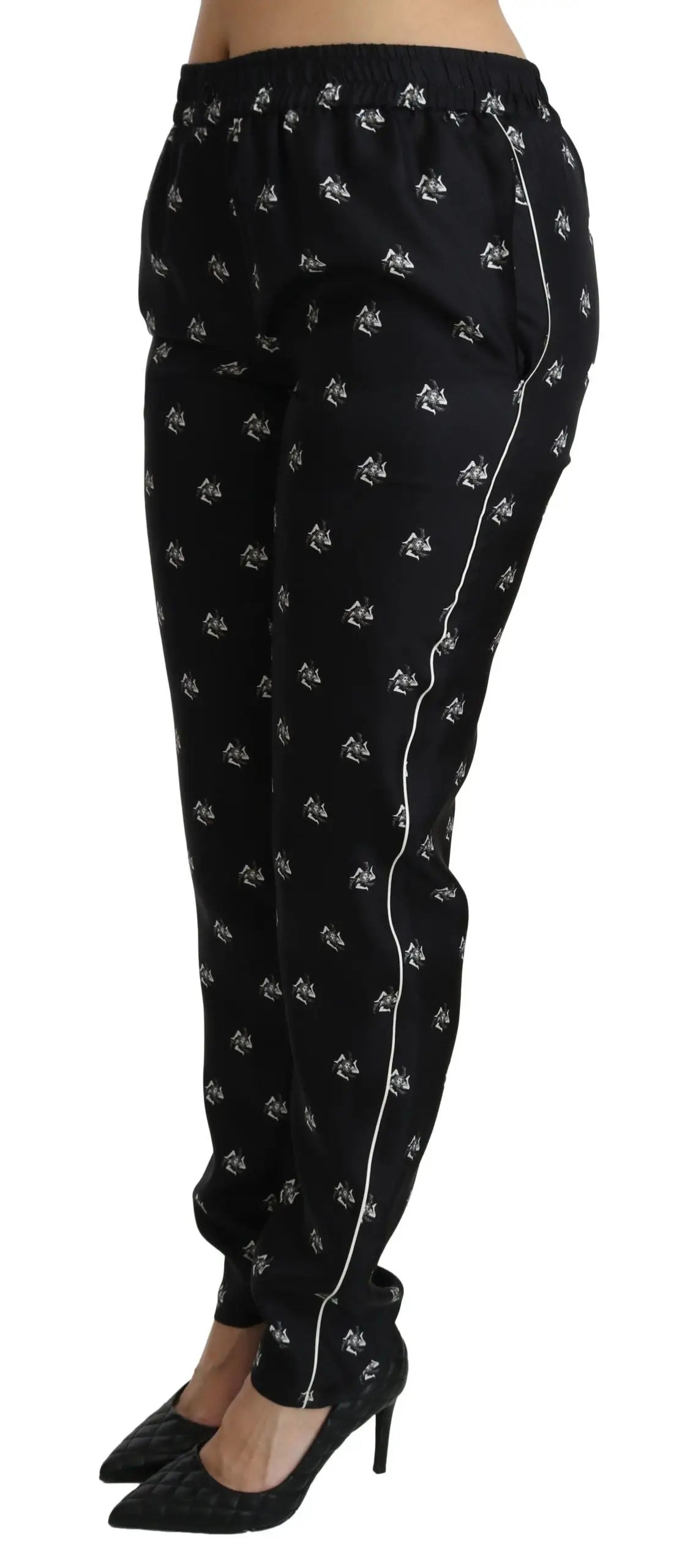 Pantalon skinny en soie noir dolce & gabbana avec motif voile blanc subtil et bandes latérales blanches assorties