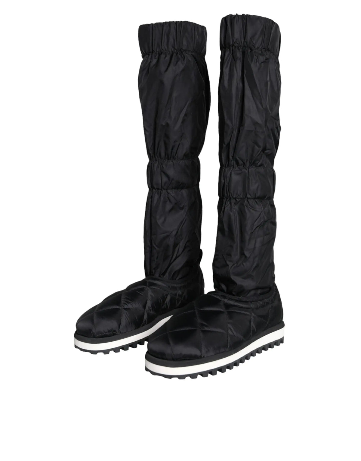 Dolce & gabbana bottines noires matelassées montantes avec semelles en caoutchouc blanc et poignets élastiqués