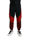 Joggers dolce gabbana en nylon noir et rouge avec panneaux et imprimé léopard aux poignets