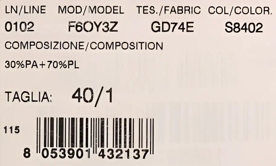 Étiquette d une robe droite sequins rouge et noir dolce & gabbana en polyester 30 pour cent polyamide 70 pour cent code couleur s8402
