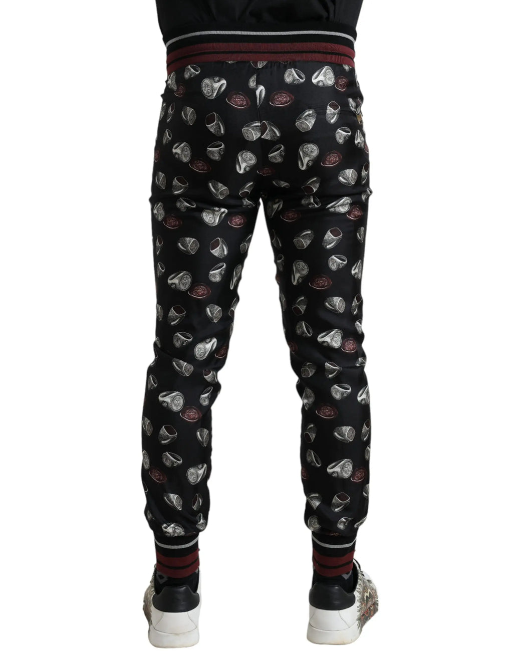 Pantalon de jogging en soie noir dolce & gabbana avec motif répétitif d’anneaux argent et bordeaux