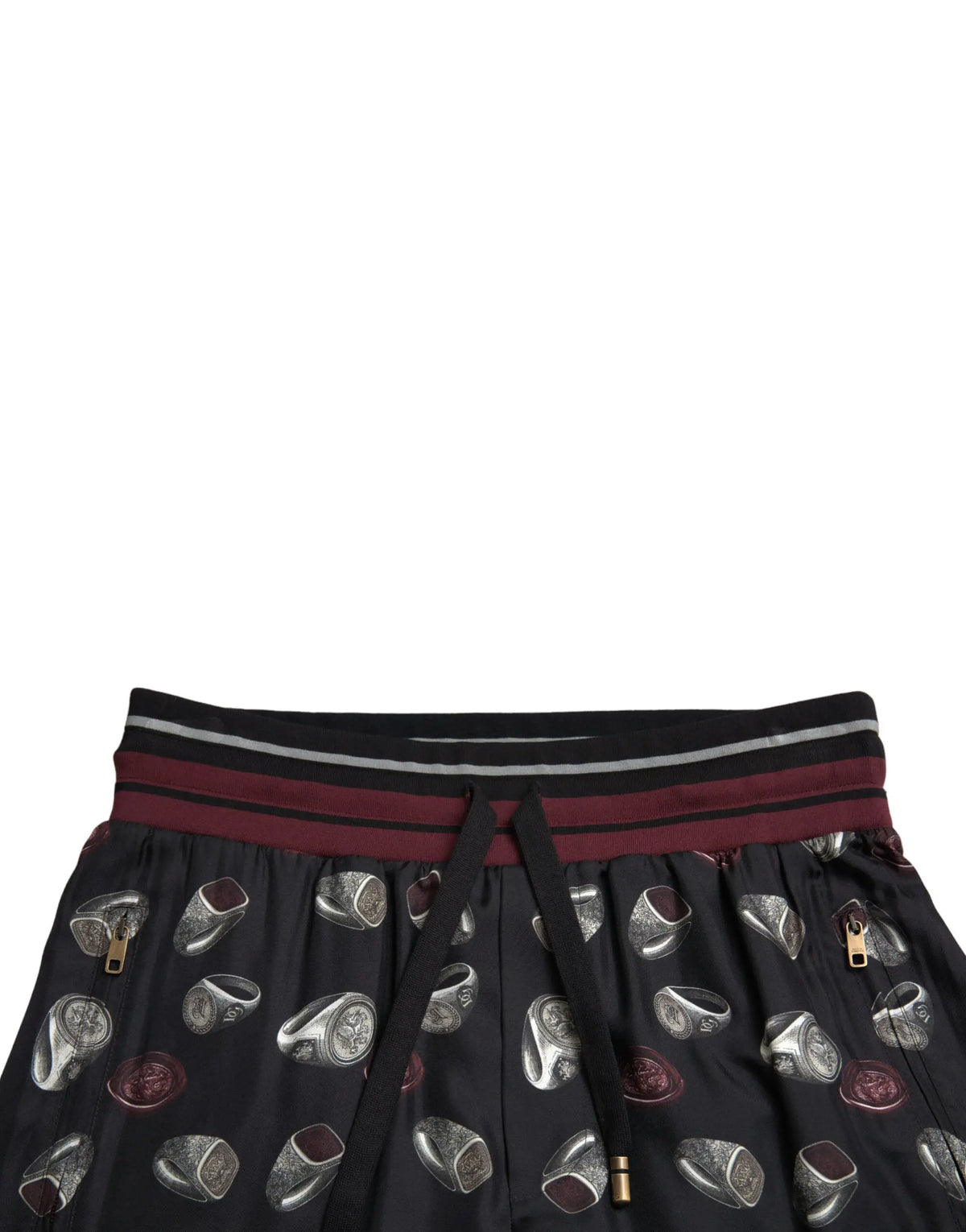 Pantalon jogging en soie dolce & gabbana noir avec motif anneaux argent et bordeaux et taille rayée en noir blanc et bordeaux