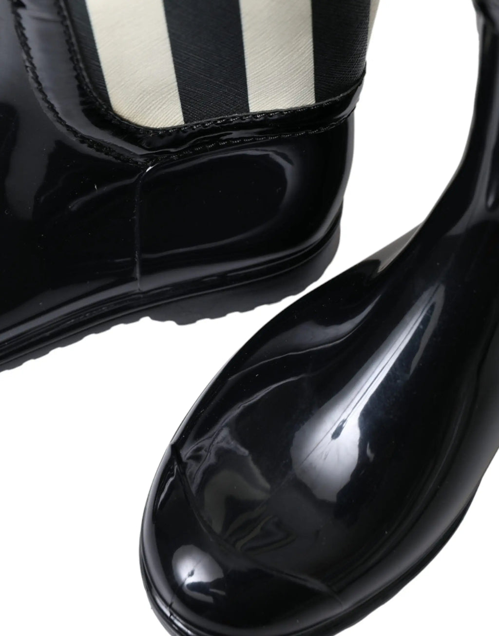 Bottes plates noires en caoutchouc dolce et gabbana à tige haute avec bord en tissu rayé