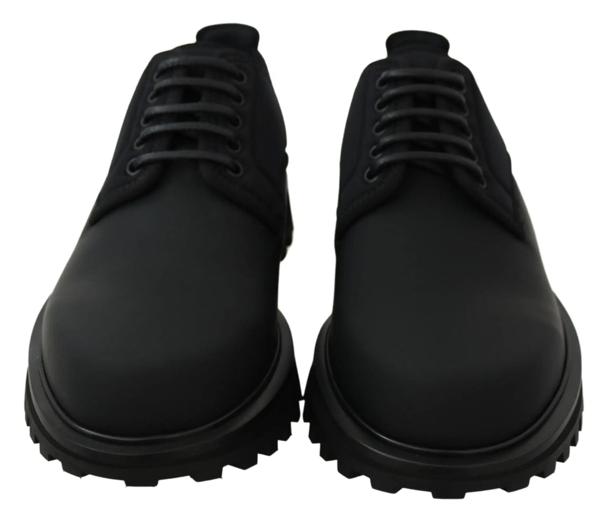 Bottes derby noires dolce & gabbana en cuir de veau rubberisé avec semelles épaisses et robustes