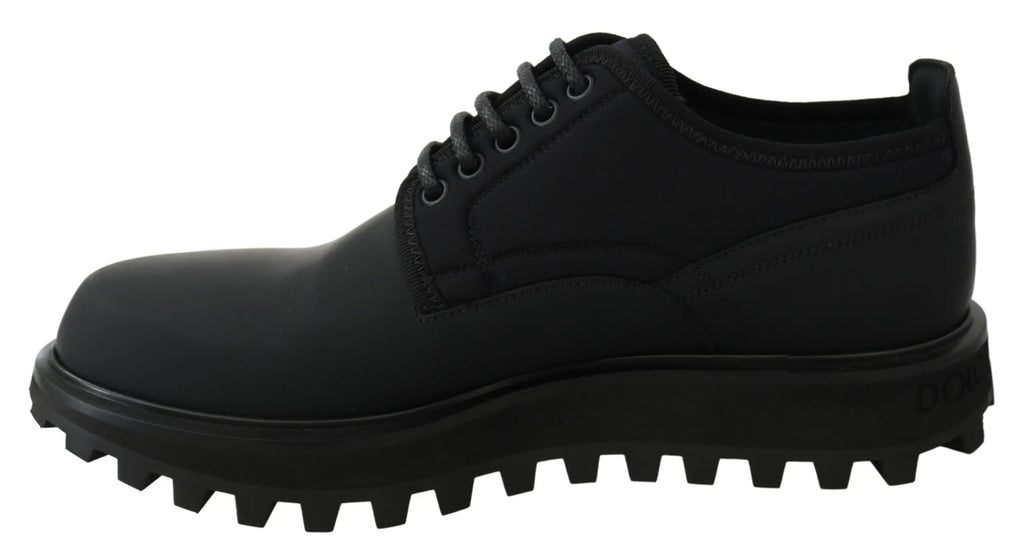 Botte de travail noire en cuir de veau caoutchouté dolce & gabbana avec semelle robuste et lacets