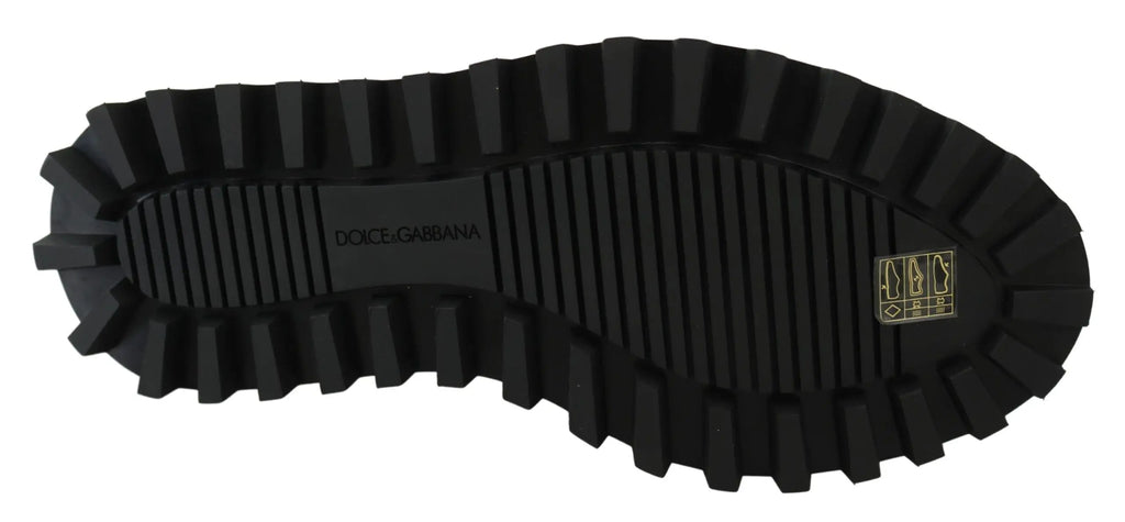Semelle extérieure noire en caoutchouc avec motif agressif et branding dolce & gabbana sur chaussures derby en veau