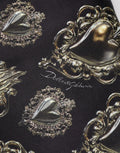 Écharpe en soie noire dolce & gabbana avec motifs cœurs argent ornés daccents dorés pour sweatshirt en coton