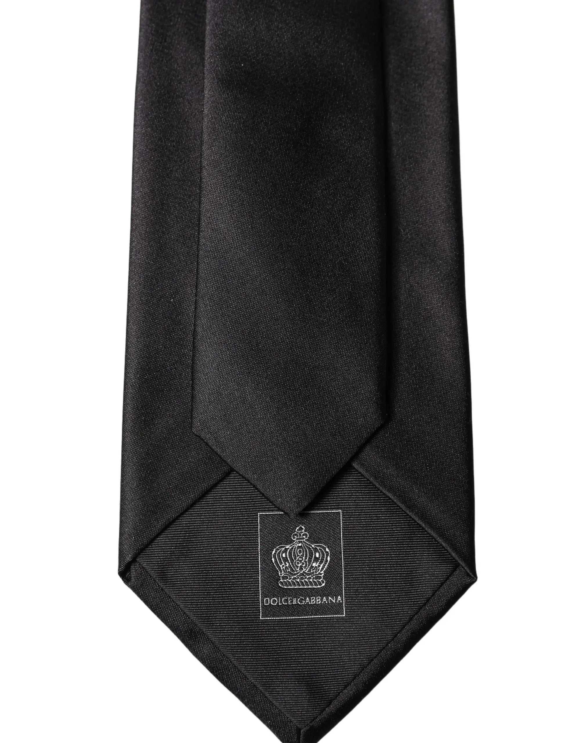 Cravate noire en satin dolce gabbana 100 pour cent soie avec logo couronne brodé et étiquette dolce gabbana