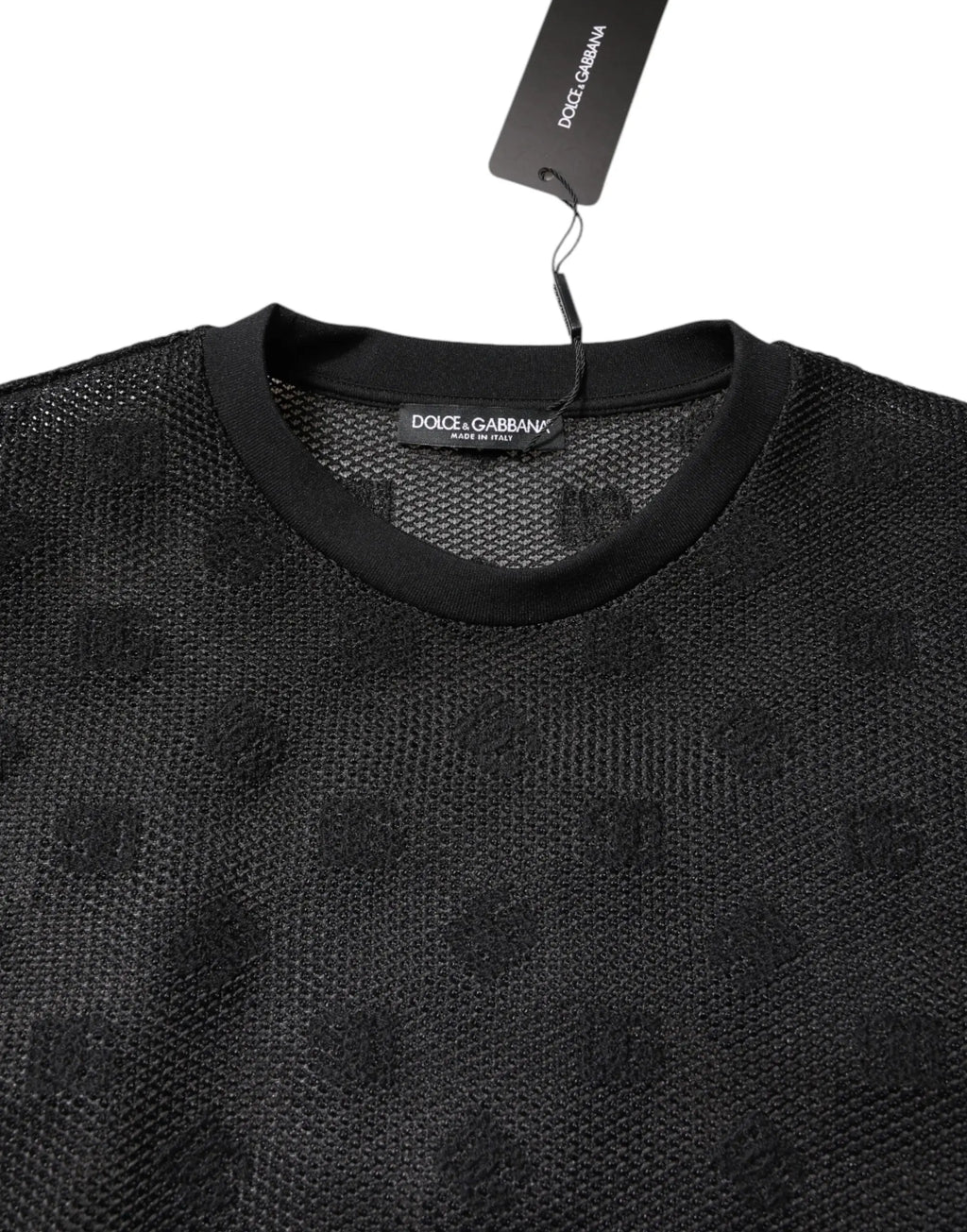 Dolce gabbana t shirt noir à manches courtes see through avec tissu en maille texturée et motifs crâne embossés subtils