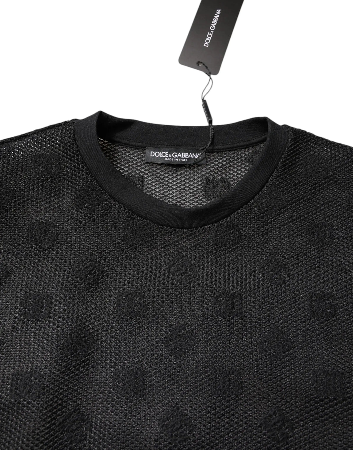 Dolce gabbana t shirt noir à manches courtes see through avec tissu en maille texturée et motifs crâne embossés subtils